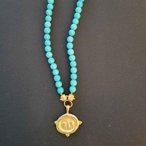 Turquoise like necklace with bee medallion